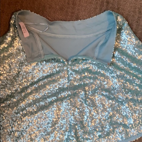 Turquoise skirt with sequins. - Picture 2 of 3